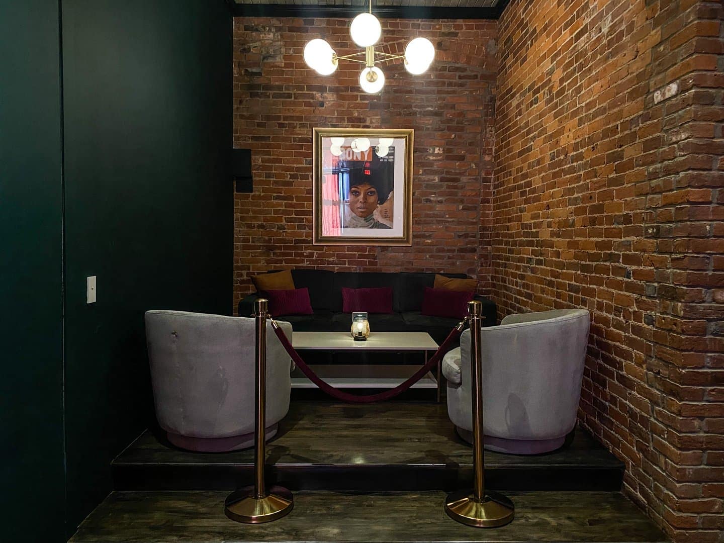 A candlelit booth at Dabney & Co. — date night in Kalamazoo